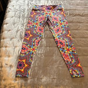 Positive Creations x Visionlab leggings with artwork by Chris Dyer M